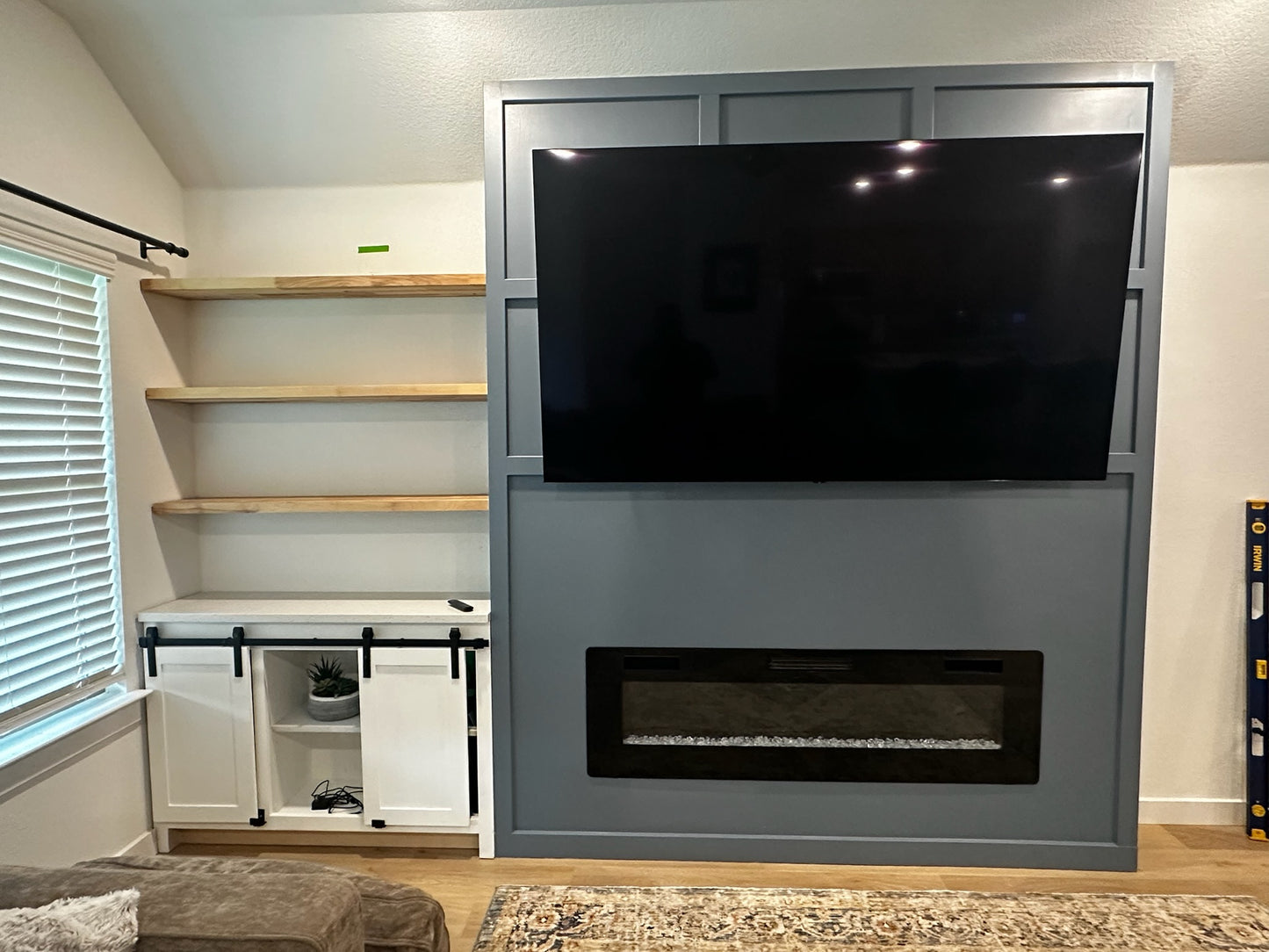 Custom Bump Out with Electric Fireplace, Handmade Shelves & Custom Cabinet