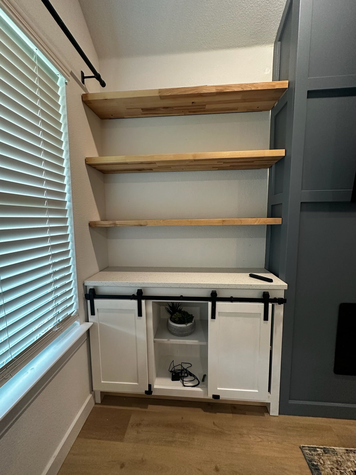 Custom Bump Out with Electric Fireplace, Handmade Shelves & Custom Cabinet