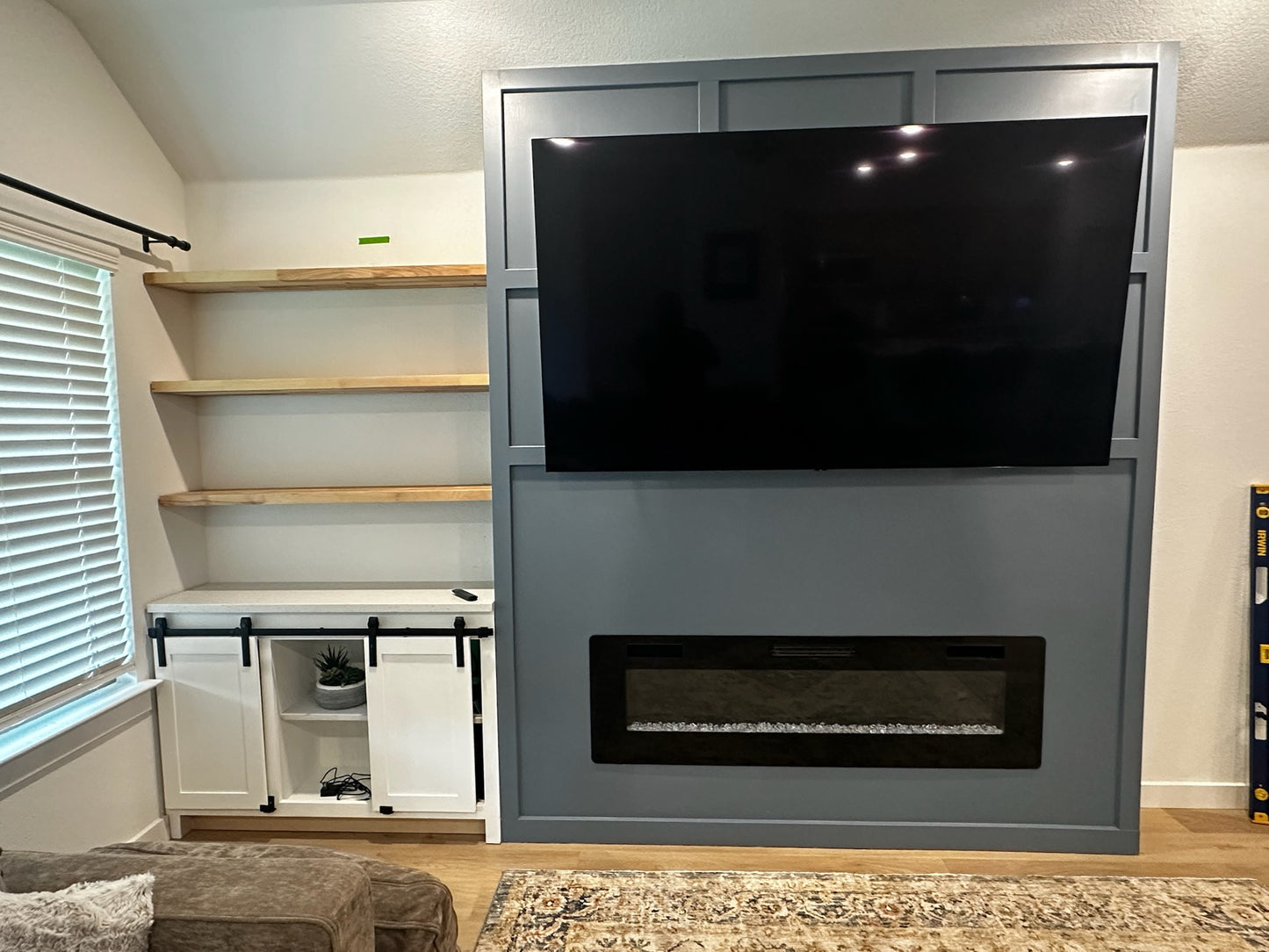 Custom Bump Out with Electric Fireplace, Handmade Shelves & Custom Cabinet