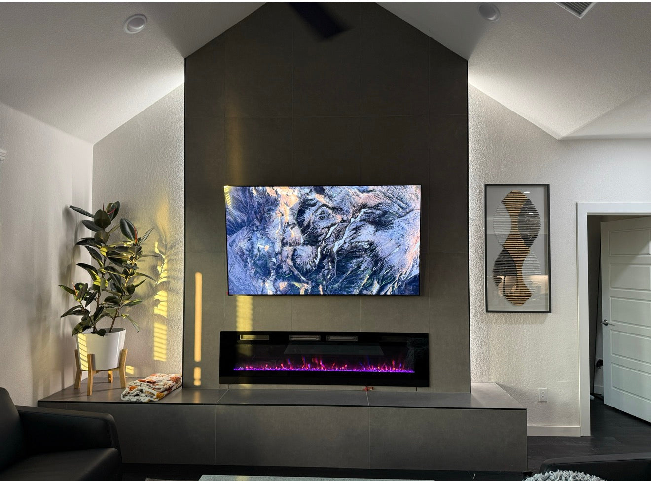 Custom Floor-to-Ceiling Modern Bump Out with Electric Fireplace, Oversized Tile & Handmade Bench