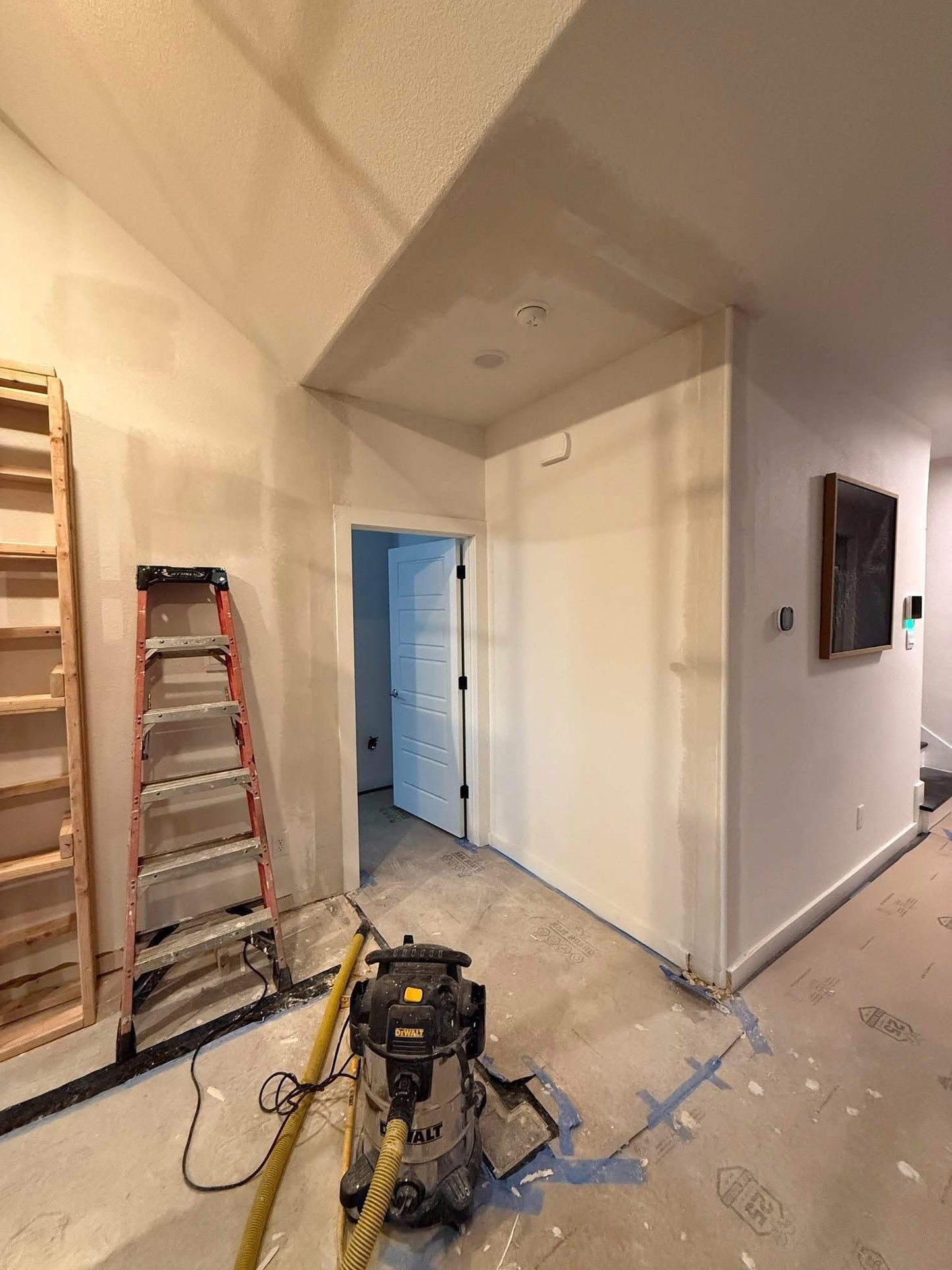 Open Walkway & Wall Removal with Drywall Finish