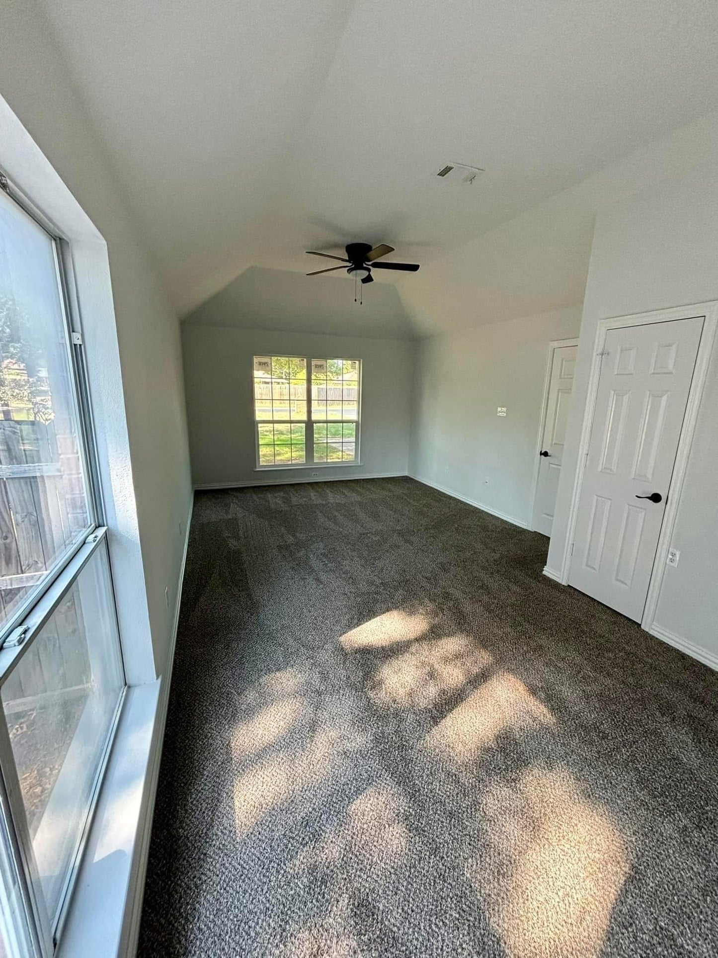 Bedroom Remodel with New Windows, Flooring, and Paint