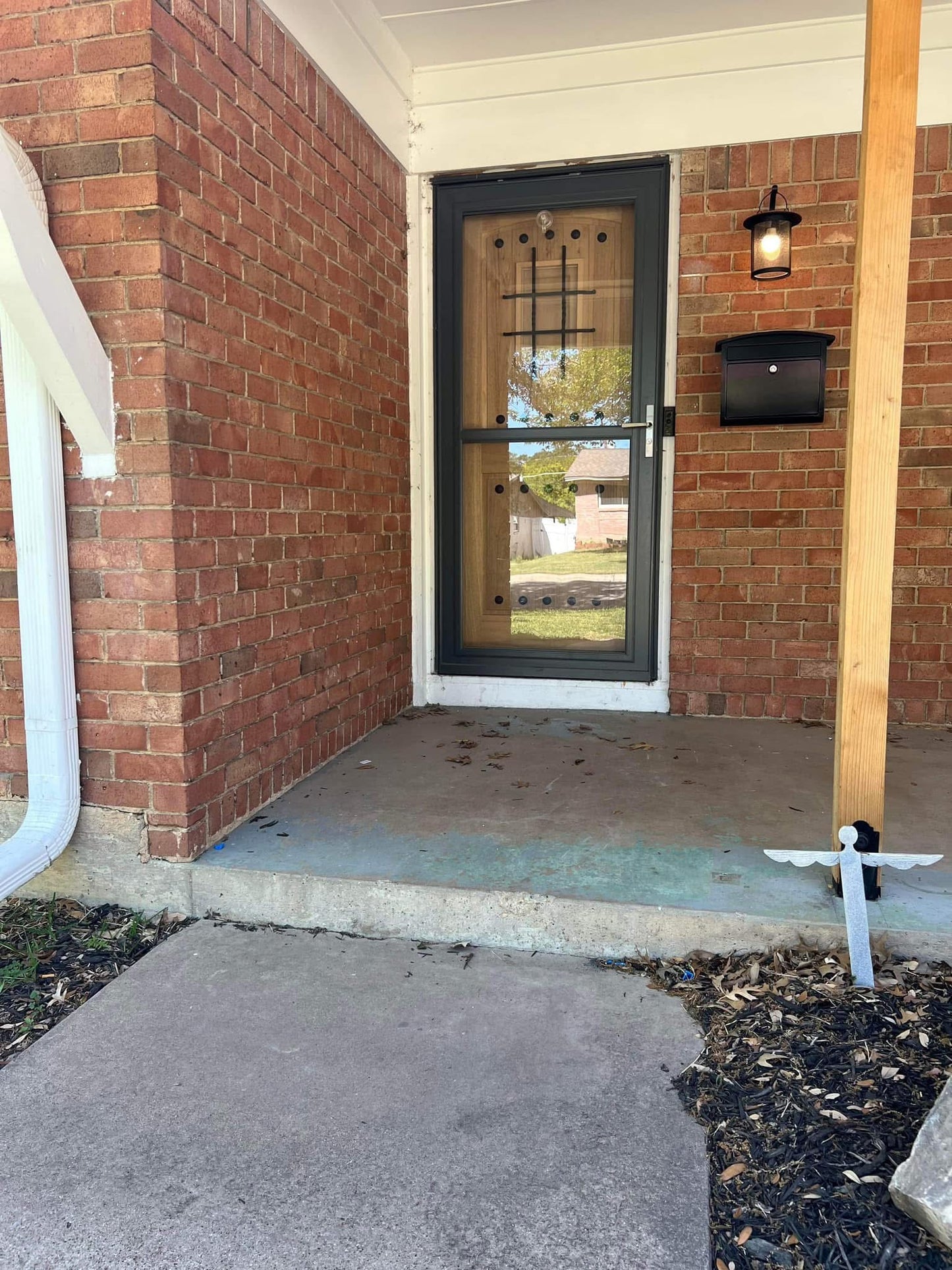 Exterior House Remodel with Open Porch & Cedar Posts